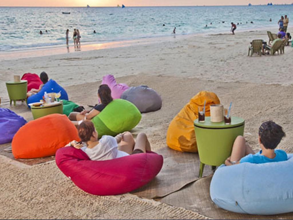 The Sand Pod is the hotel's beachfront lounging area equipped with sun beds and colorful bean bags.