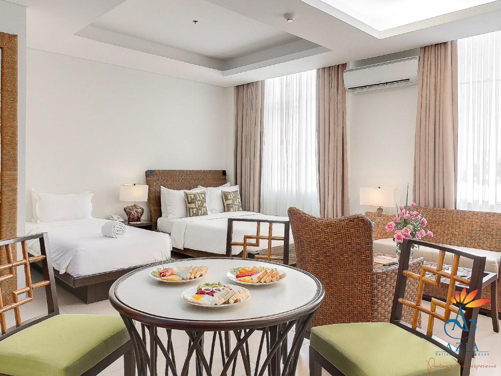 Junior Suite includes breakfast complimentary water coffee or teas good for 3 Room consists of 2 salas.