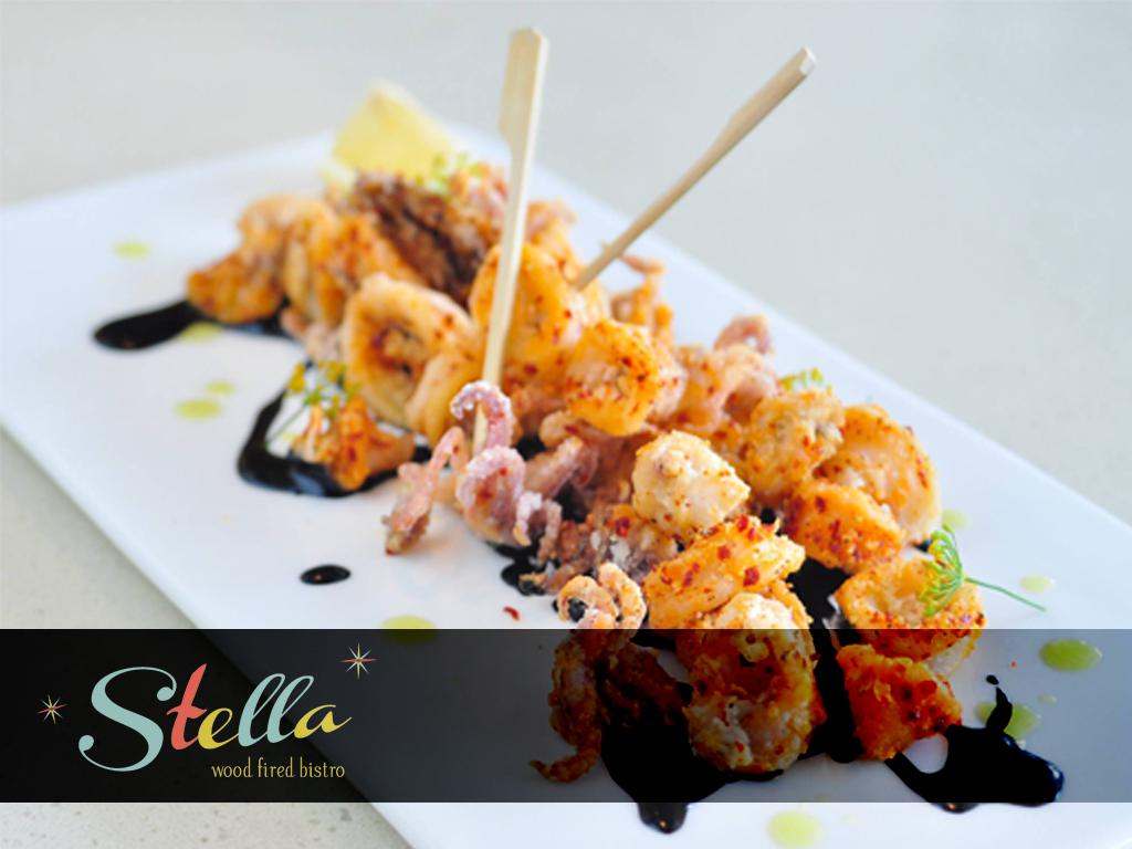 Start and munch some Calamari Frito while deciding what you want STELLA